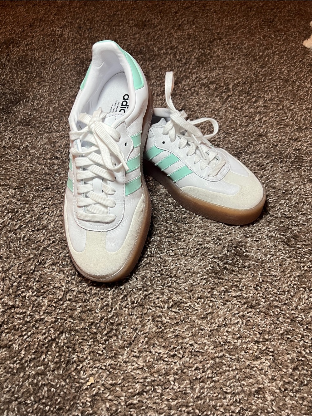 adidas Men’s White Sneakers with Mint Green Stripes